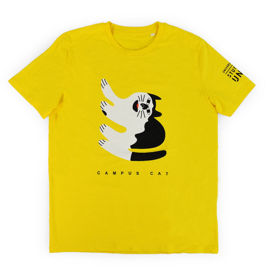 A yellow t-shirt with the words " Campus Cat" on the front and an illustration of a black and white cat printed on it