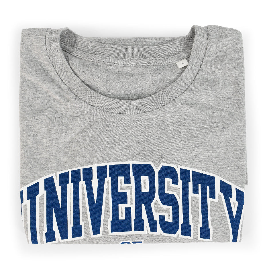 Heather Grey Organic T-Shirt folded up to show "University" printed on the front in varsity style font 